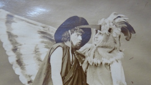 Black and white image of a man and a bird from the 1883 production