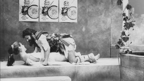 Myrhinne and Kinesias in Lysistrata 1986