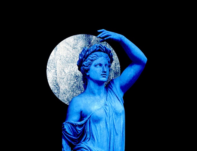 Blue Ancient statue (female) holding the silver moon on her back